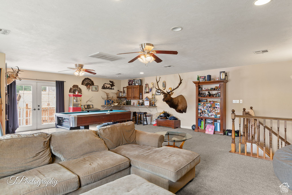 Living area with billiards table, carpet floors, french doors, ceiling fan, and recessed lighting