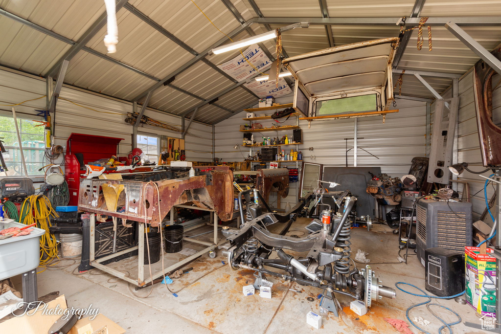 Garage featuring metal wall