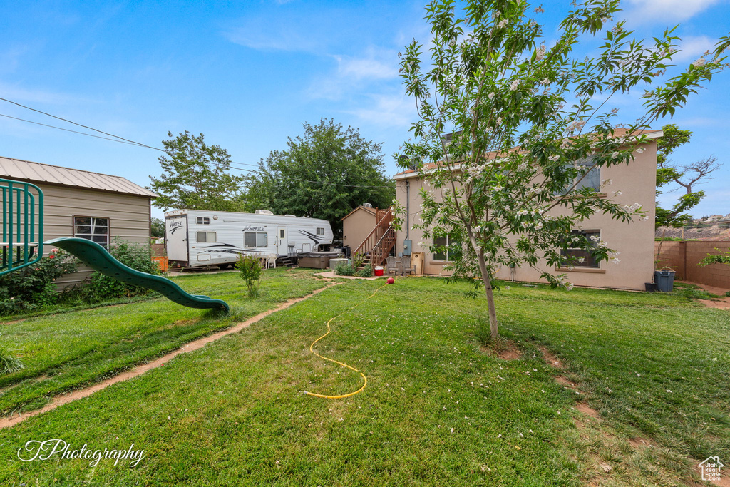 View of yard with a playground