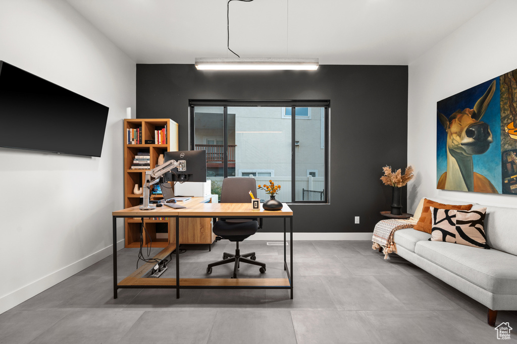 Home office featuring baseboards