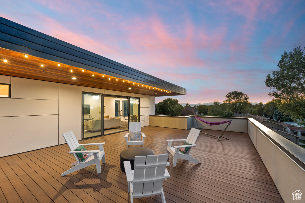 Deck at dusk with french doors