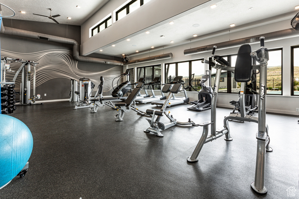 Exercise room with plenty of natural light, recessed lighting, and baseboards