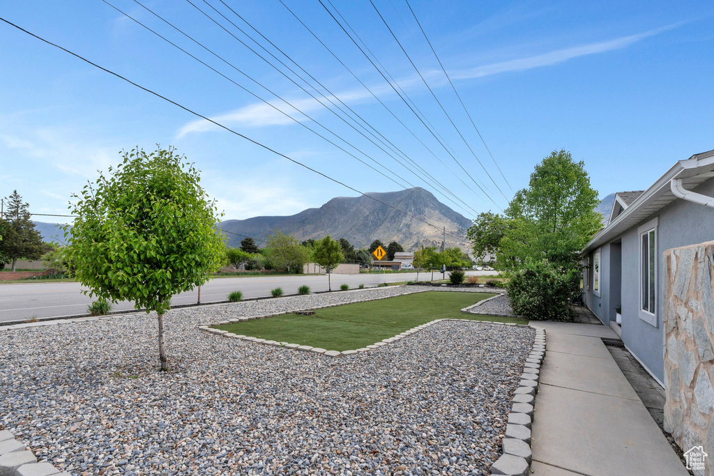 View of yard with a mountain view