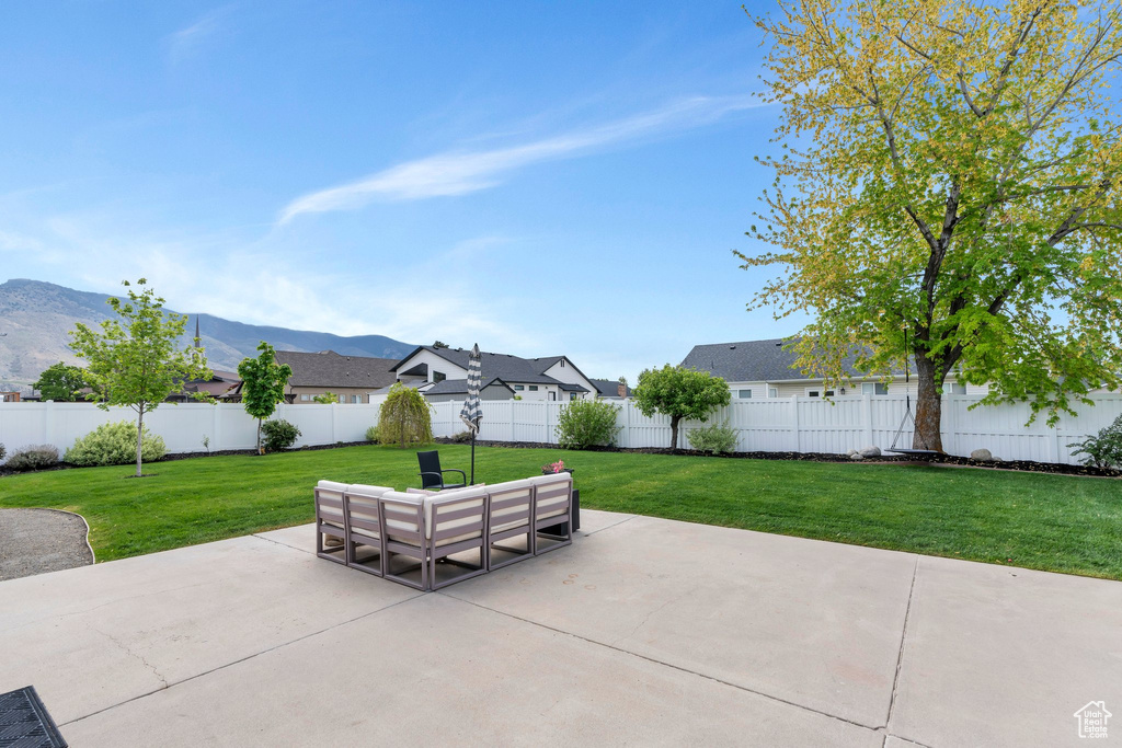 View of patio / terrace featuring a mountain view