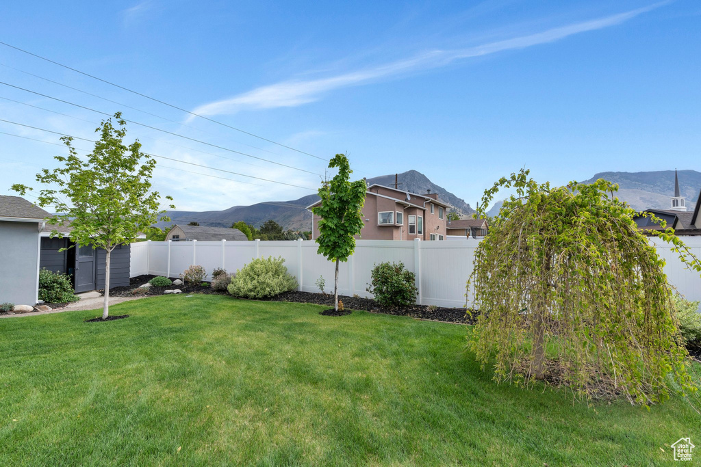 View of yard with a mountain view