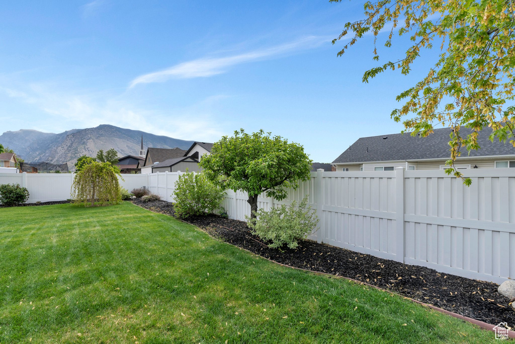 View of yard with a mountain view