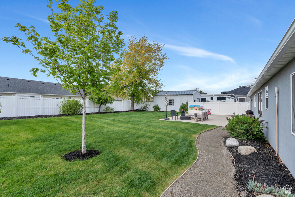 View of yard featuring a patio