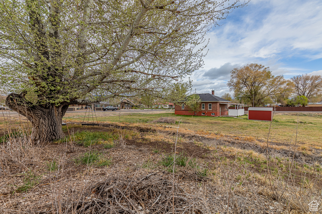 View of yard with fence