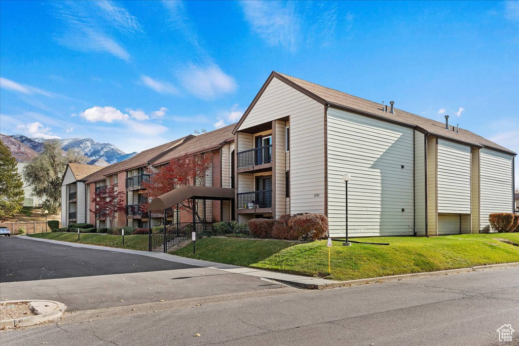 View of building exterior with a mountain view