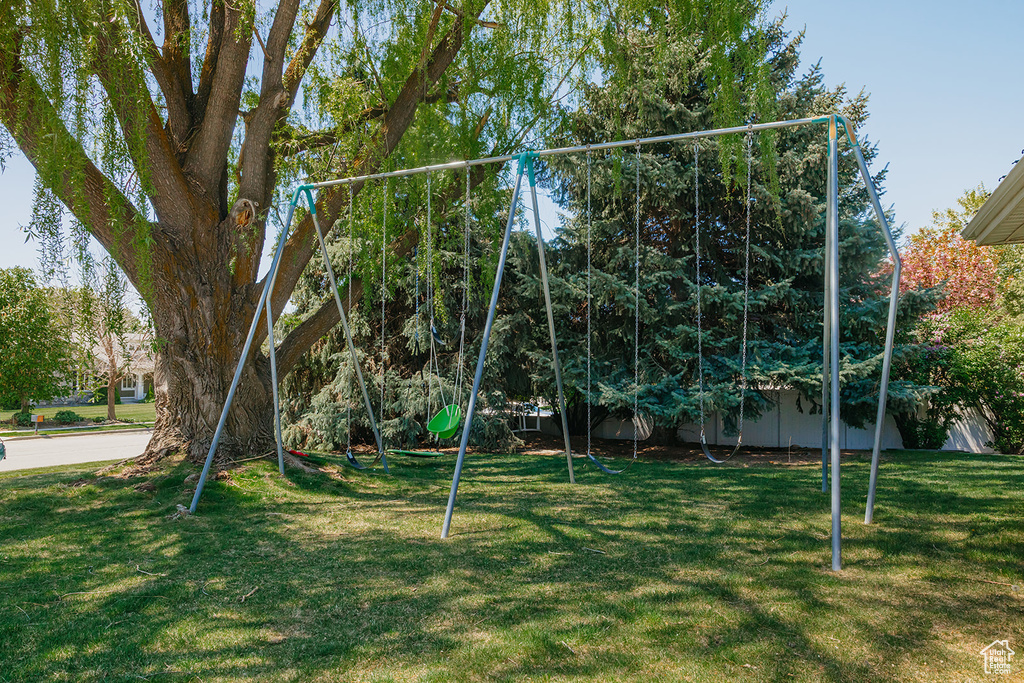 Exterior space featuring a lawn