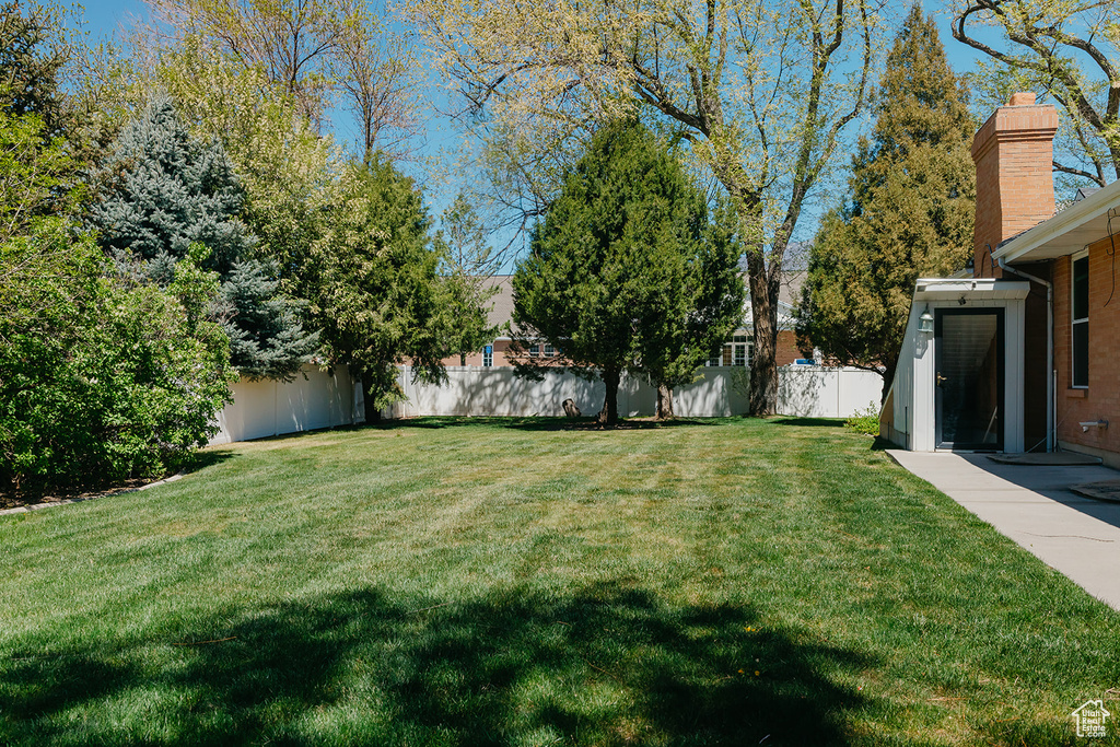 View of yard with fence