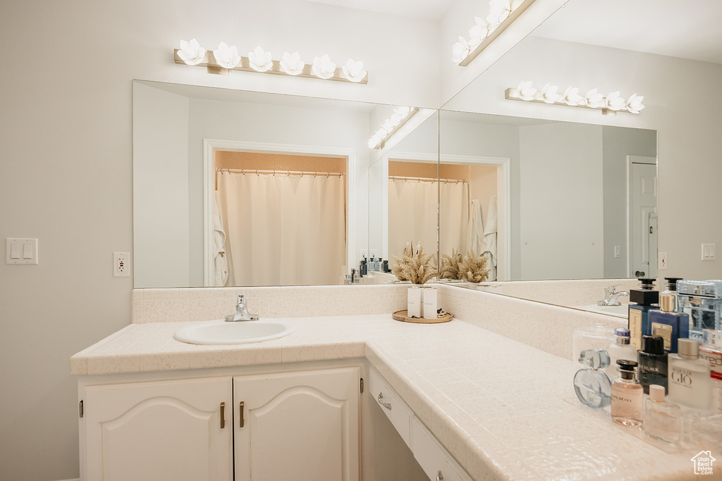 Full bathroom with vanity
