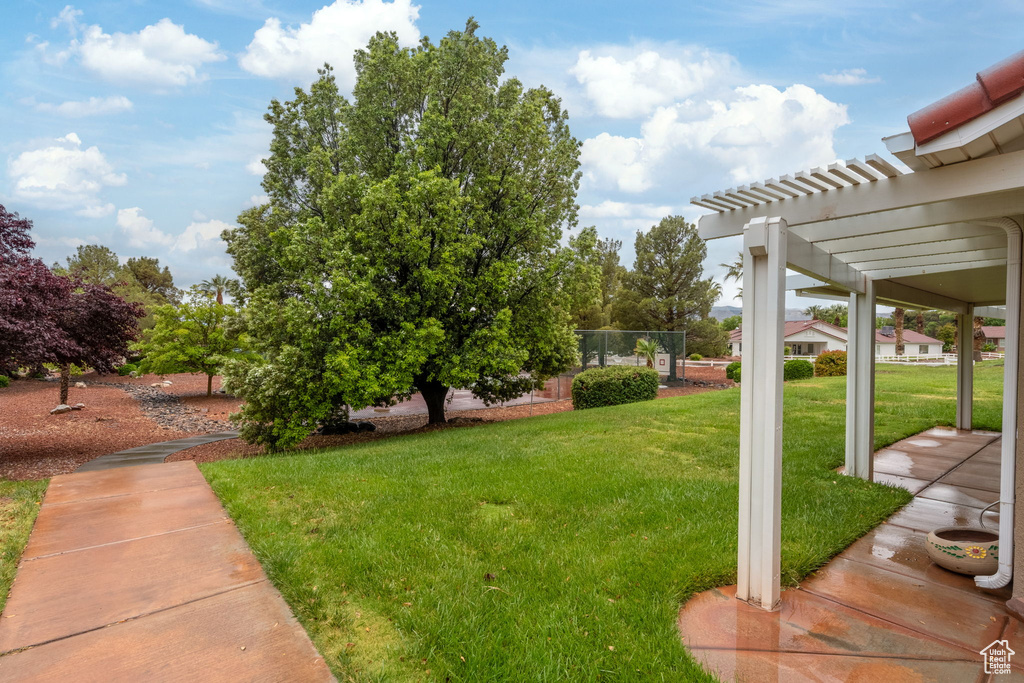 View of yard featuring a pergola
