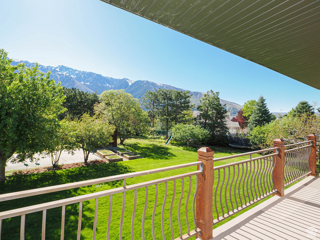Balcony featuring a deck with mountain view