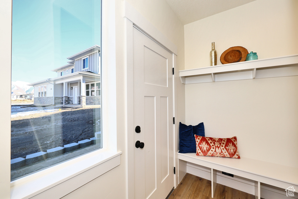 Mudroom featuring wood finished floors