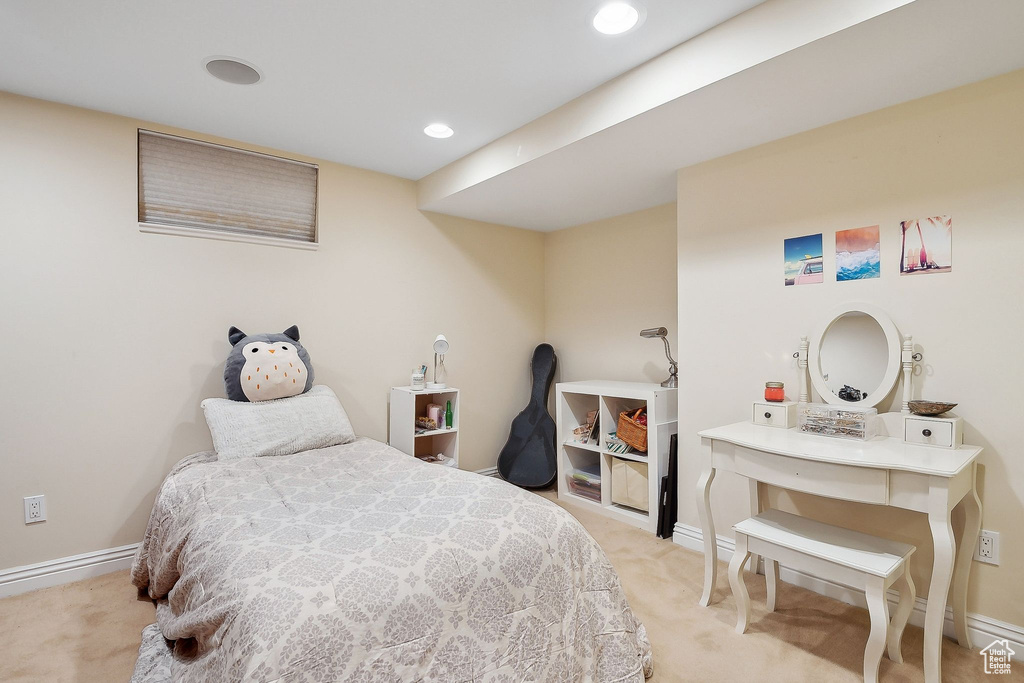 Bedroom with light carpet, baseboards, and recessed lighting