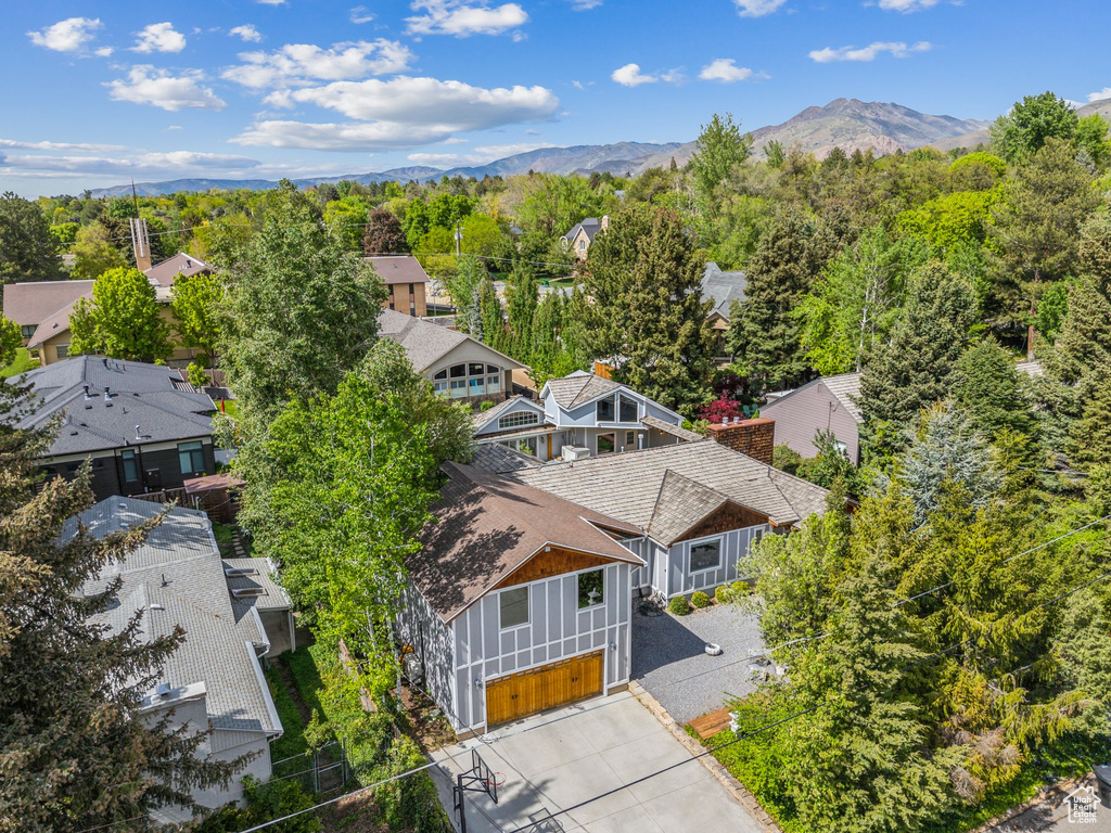 Aerial view of residential area with mountains