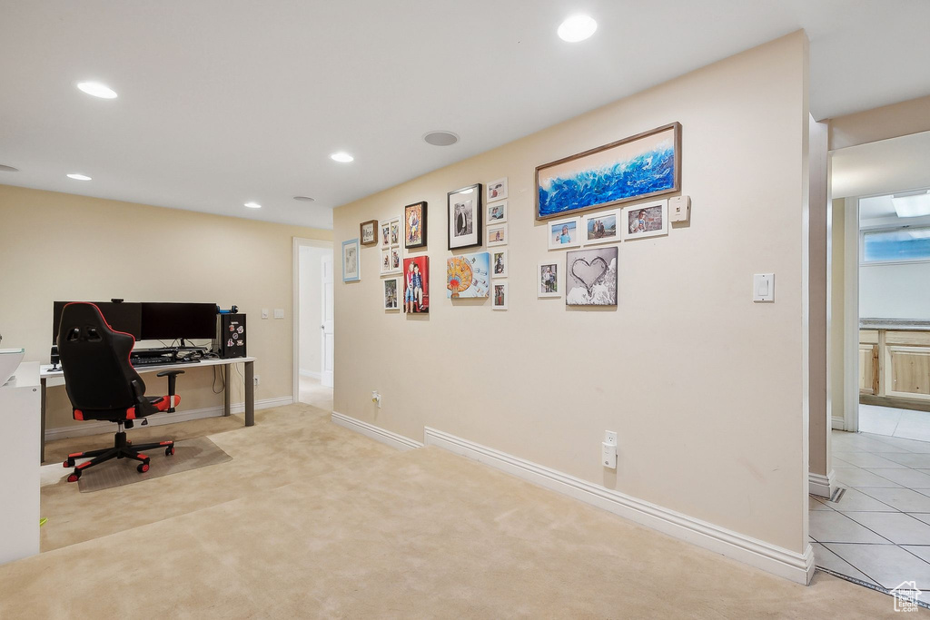 Office area with recessed lighting, baseboards, and light carpet