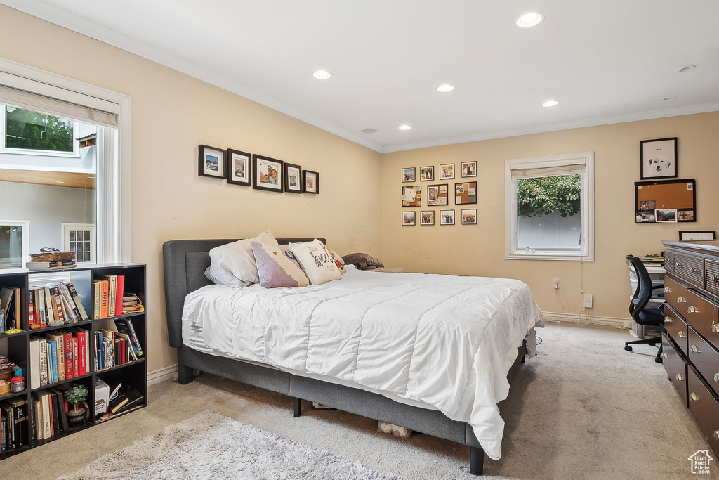 Bedroom featuring carpet flooring, recessed lighting, ornamental molding, and baseboards