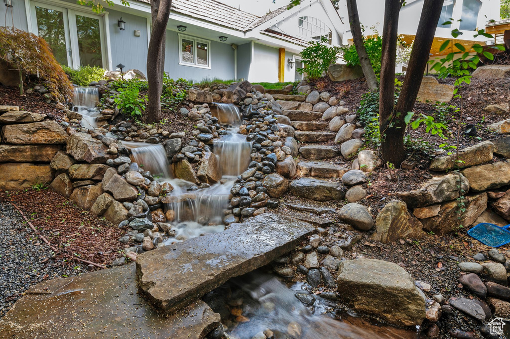 View of yard featuring a garden pond