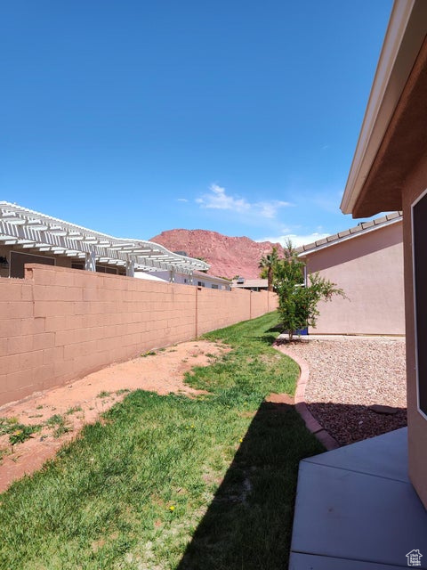 View of yard with a mountain view