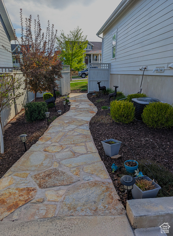 View of yard featuring fence