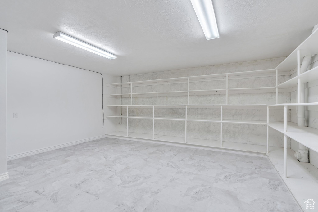 Below grade area with marble finish flooring