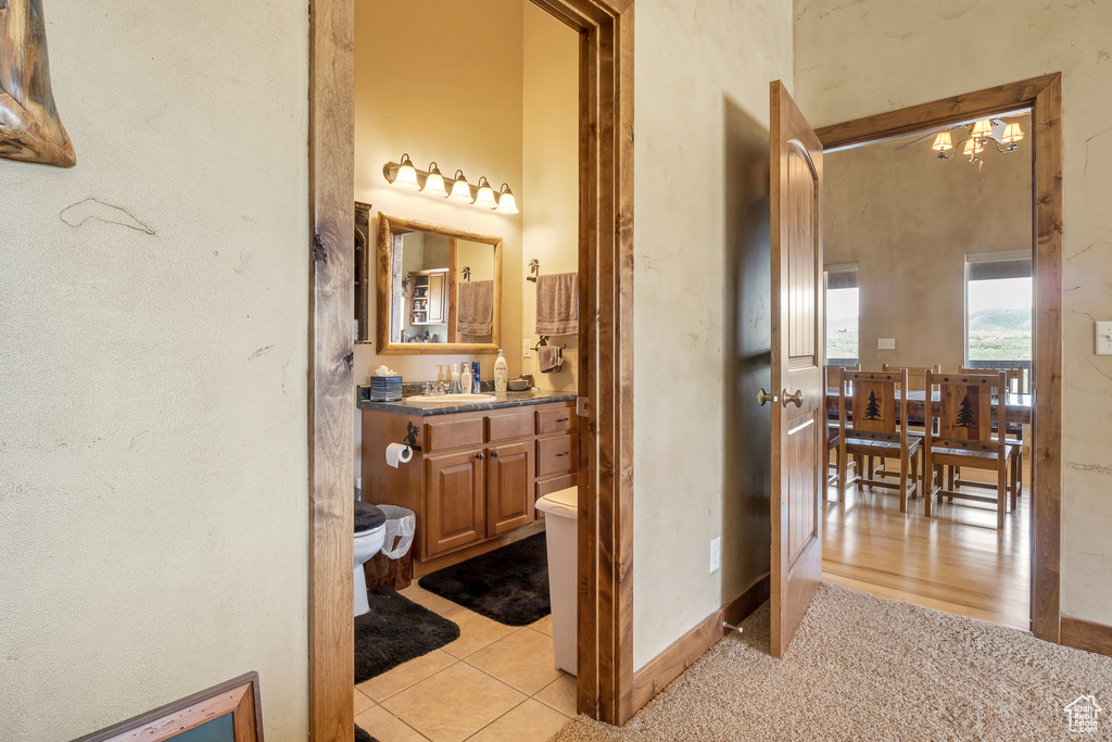 Bathroom featuring toilet and vanity