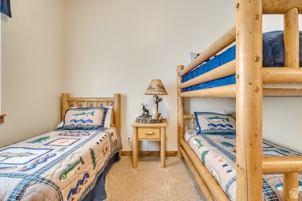 Bedroom with carpet flooring