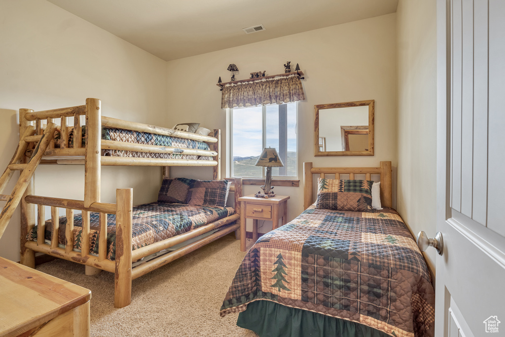 Bedroom with carpet flooring