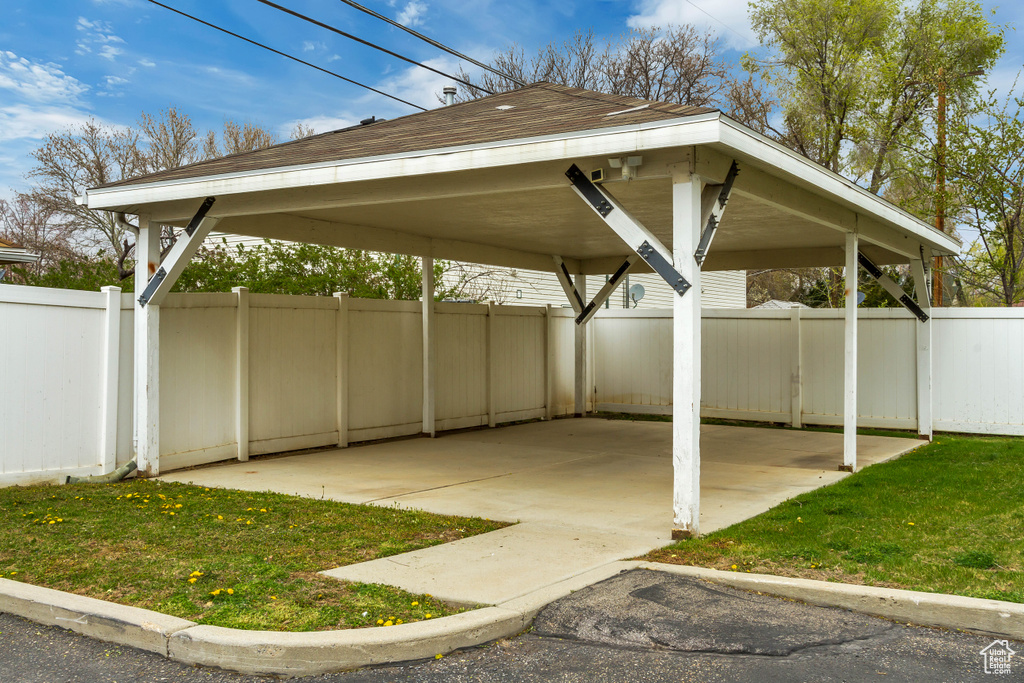 View of patio / terrace with a detached carport