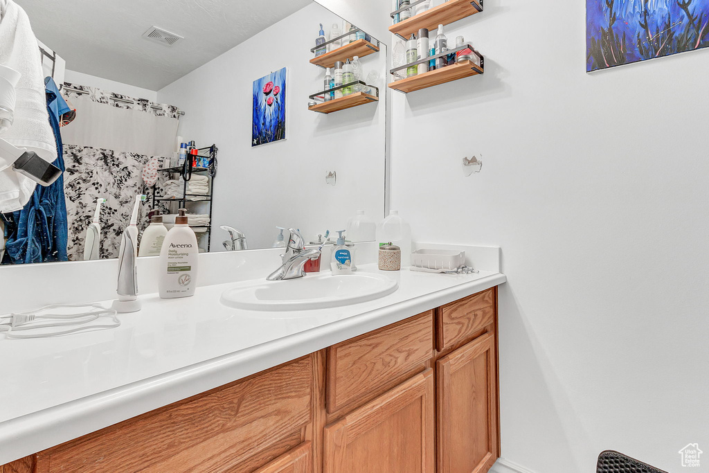 Bathroom featuring vanity