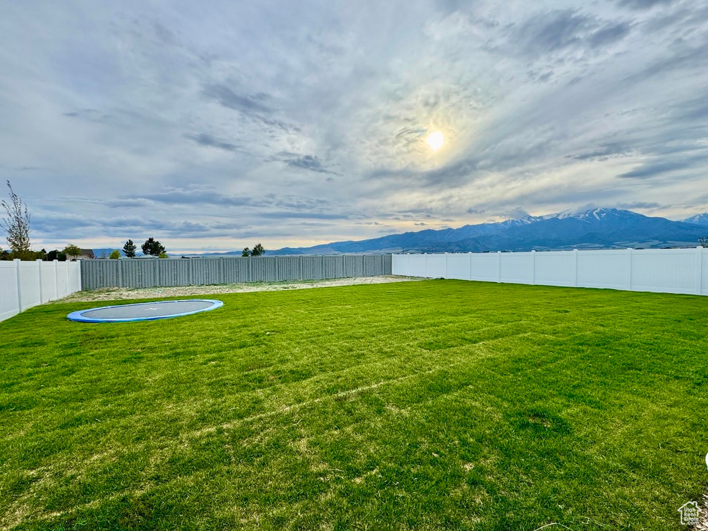 View of yard featuring a mountain view