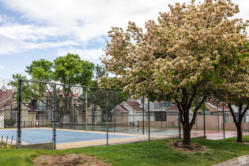 View of sport court featuring community basketball court and fence