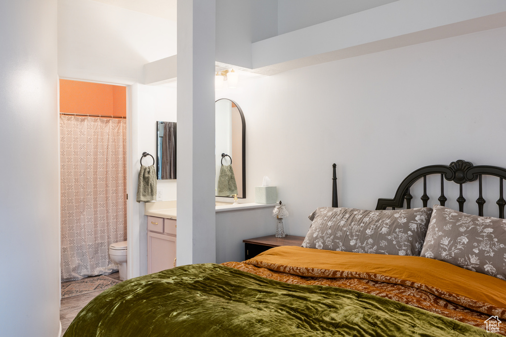 Bedroom featuring ensuite bath