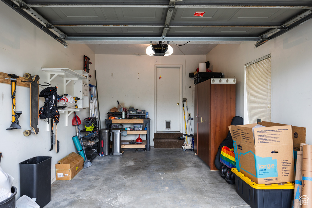 Garage featuring a garage door opener