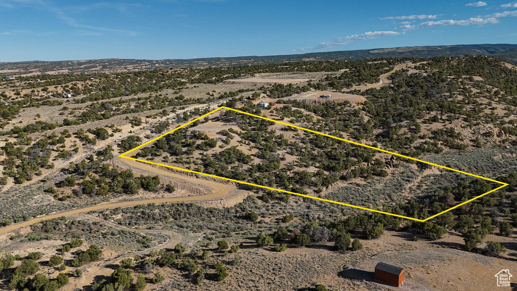 Overview of rural landscape featuring a desert landscape, property parcel outlined, and a mountain backdrop