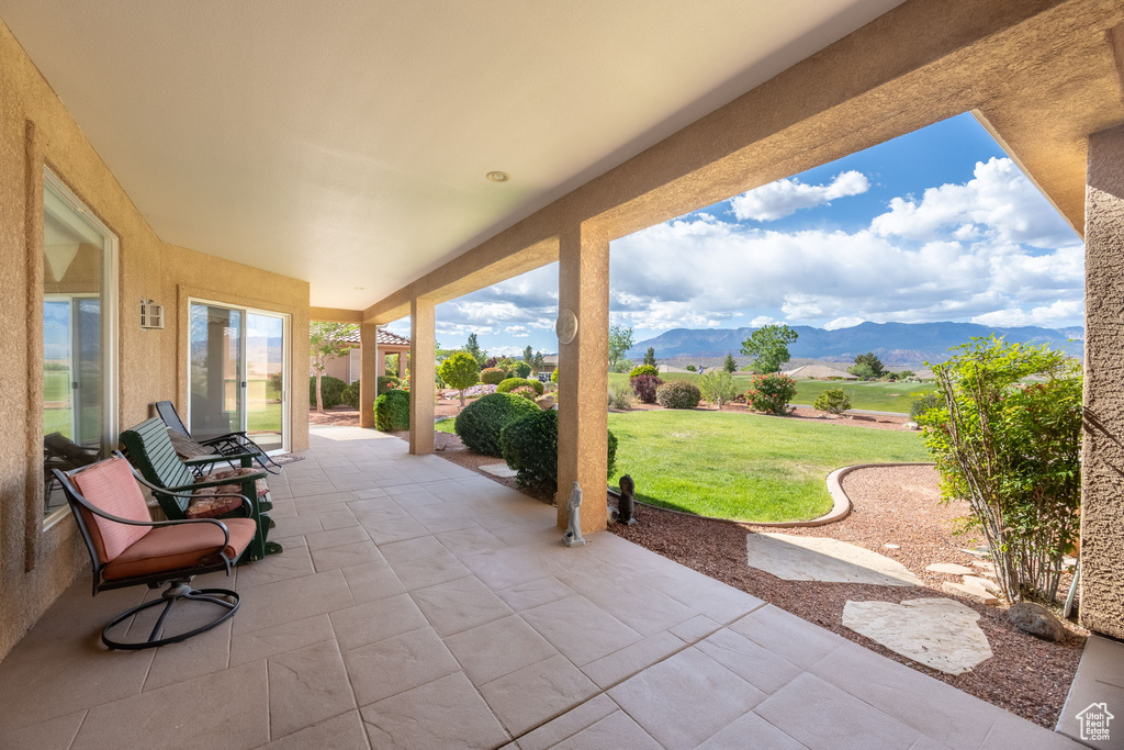 View of patio with a mountain view