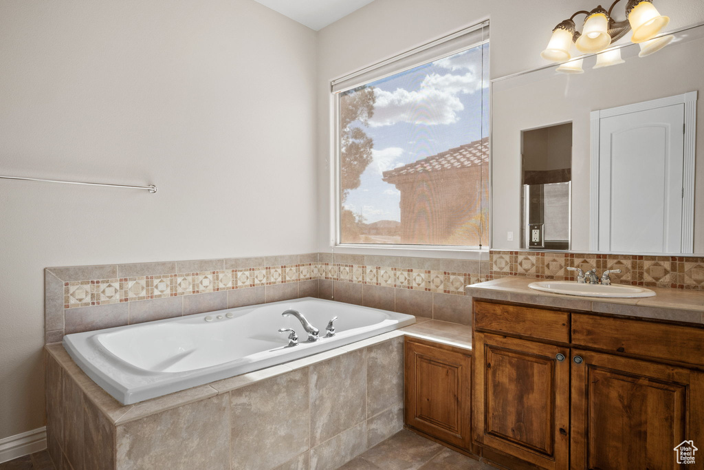 Bathroom with a garden tub and vanity