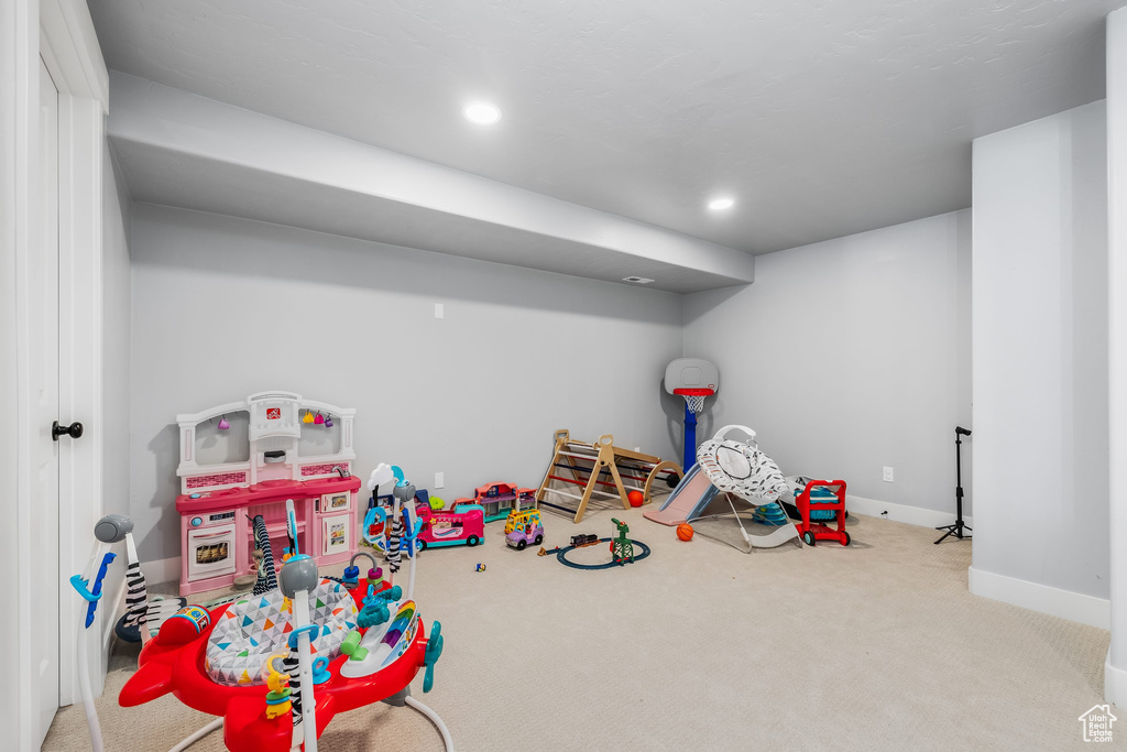 Playroom featuring carpet, baseboards, and recessed lighting