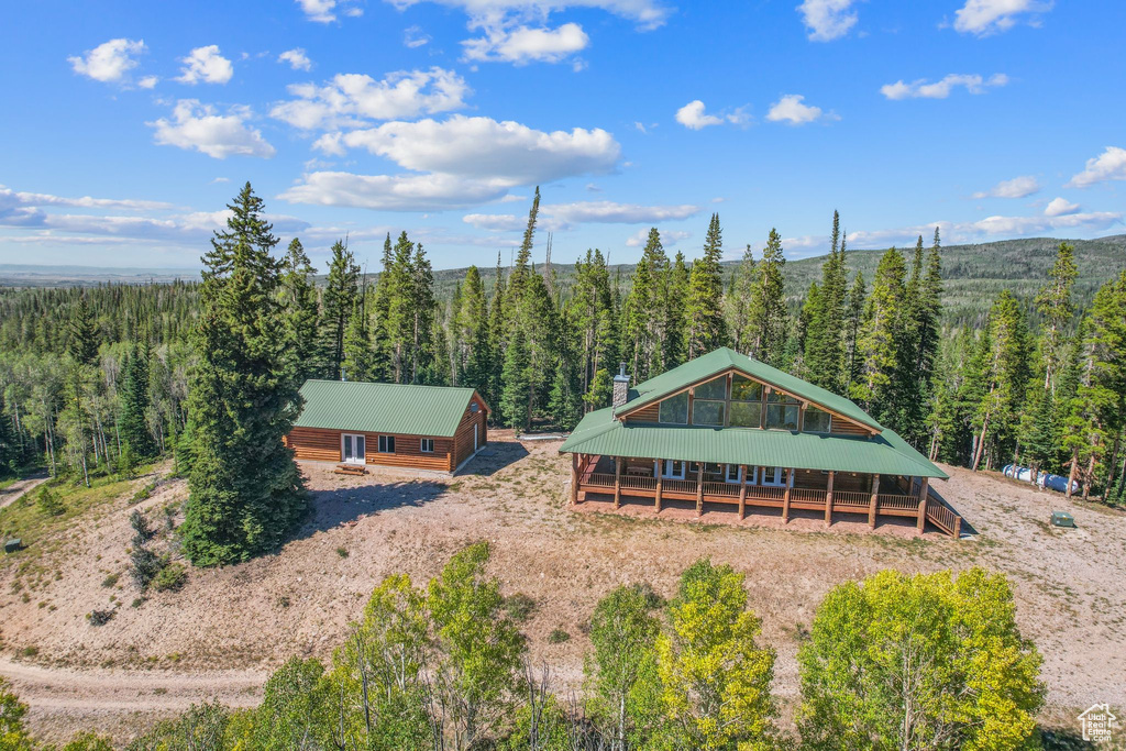 View from above of property featuring a forest