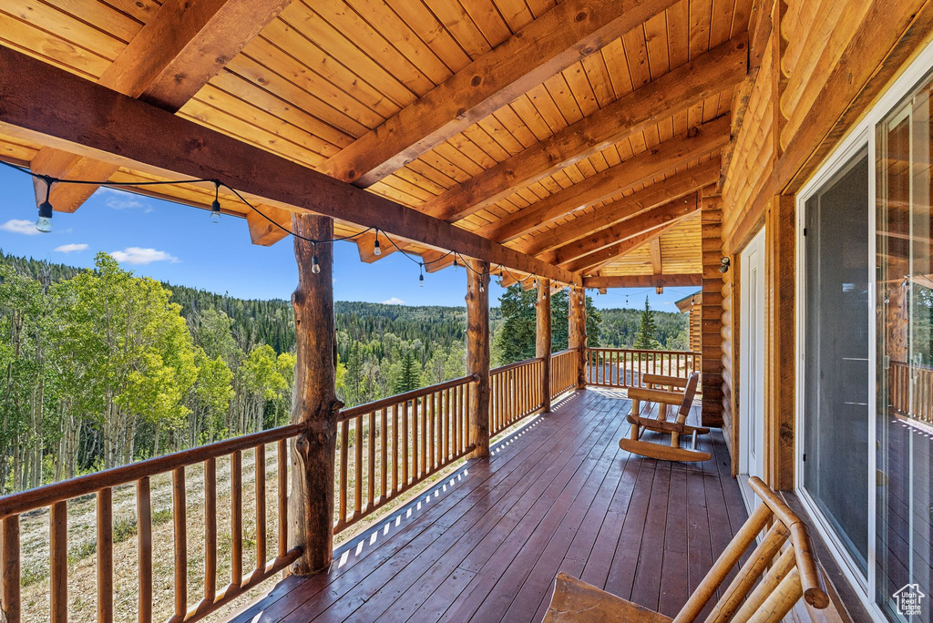Wooden terrace with a wooded view