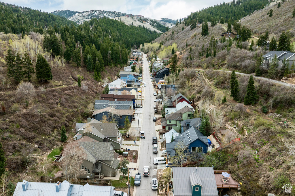 Aerial view of residential area with mountains