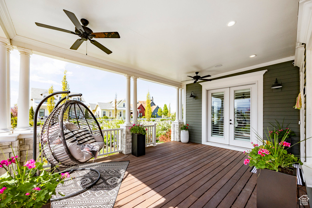 Deck featuring ceiling fan, french doors, and covered porch