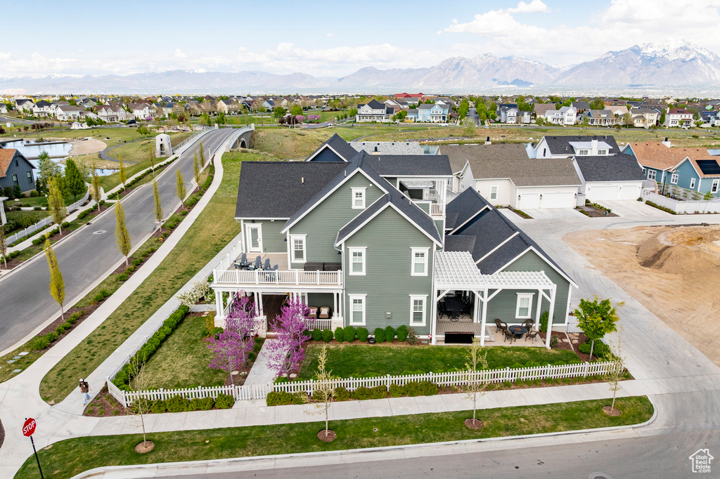 Aerial view of residential area with a water and mountain view