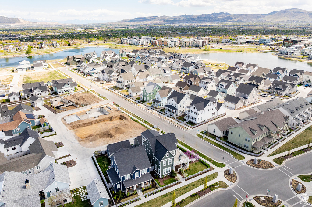 Aerial view of residential area with a water and mountain view