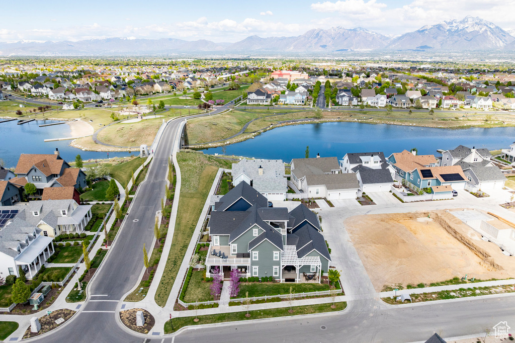 Aerial view of residential area with a water and mountain view