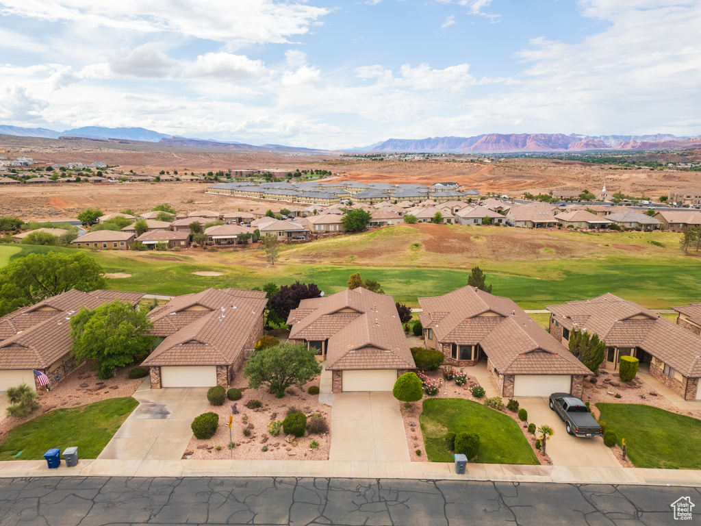 Aerial view of residential area with a mountain backdrop