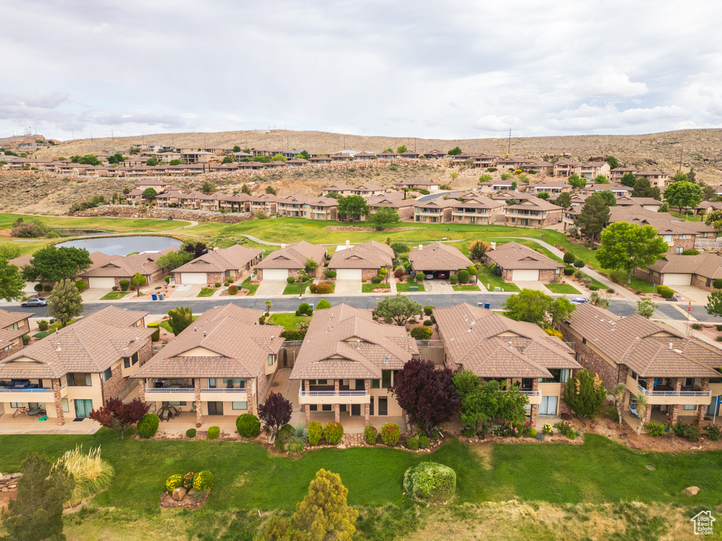 Aerial view of residential area featuring a water and mountain view