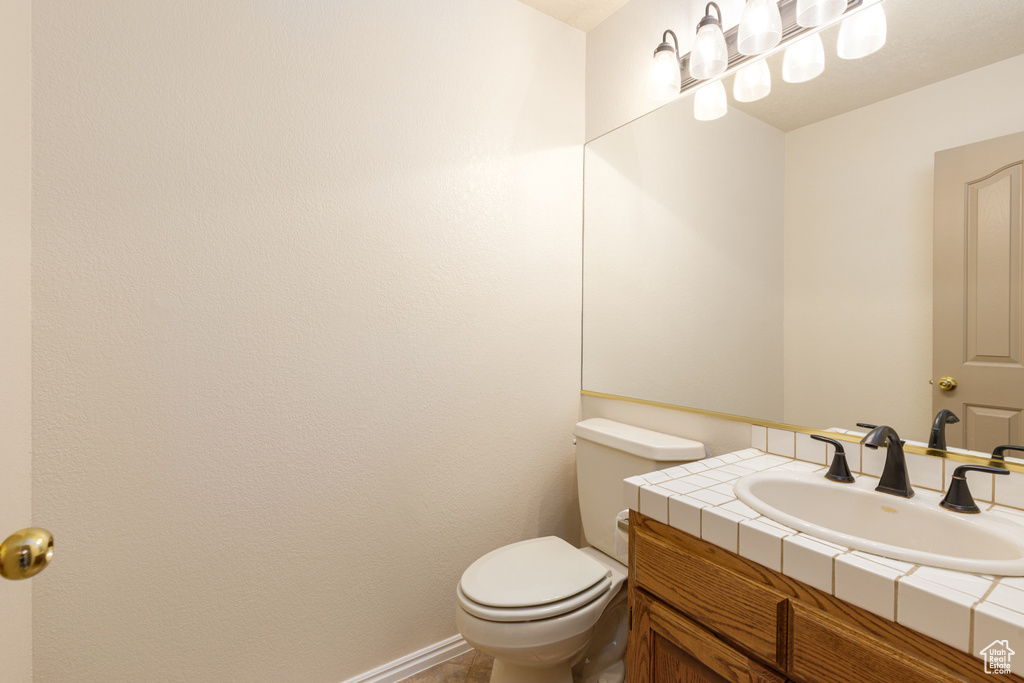 Bathroom featuring toilet and vanity